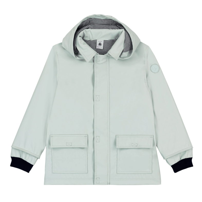 Light blue jacket with navy cuffs and trim on a white background