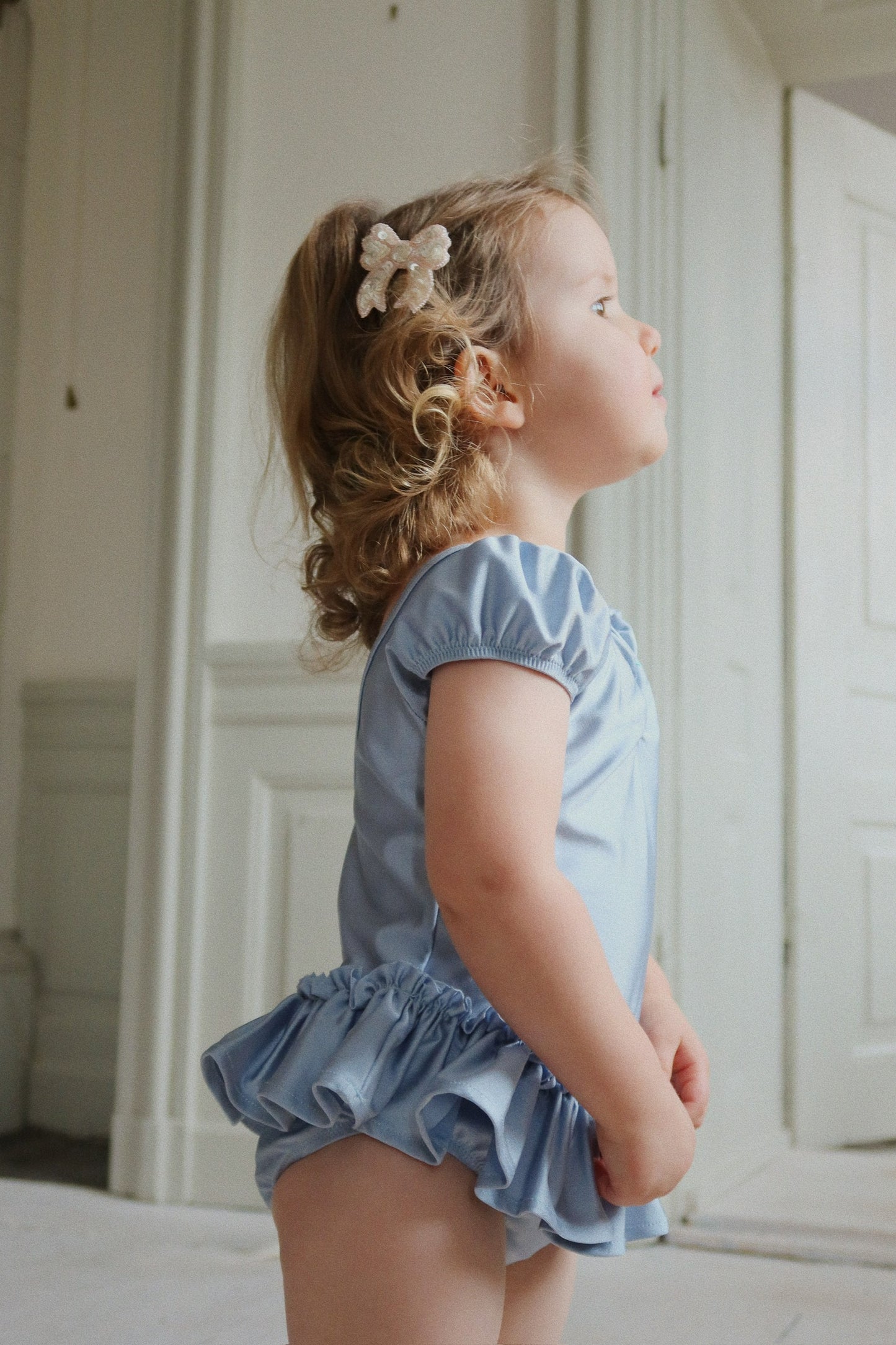 Two Pack Light White Sequin Bow Clips